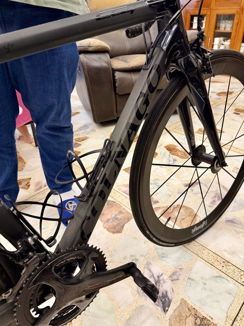 COLNAGO C64 48S BIKE (Category: Bicycles) located in Quezon City. Submitted by declutterluxury (Listing ID 1424055193, Image 2). Description: - Colnago carbon fiber road bike - Size 48S - Features super record group set - 12 speed mechanical group set - Lightweight wheels • Honest flaws: minor scratch on brake lever and rear derailleur (dropped while parked) Location: Congressional QC.