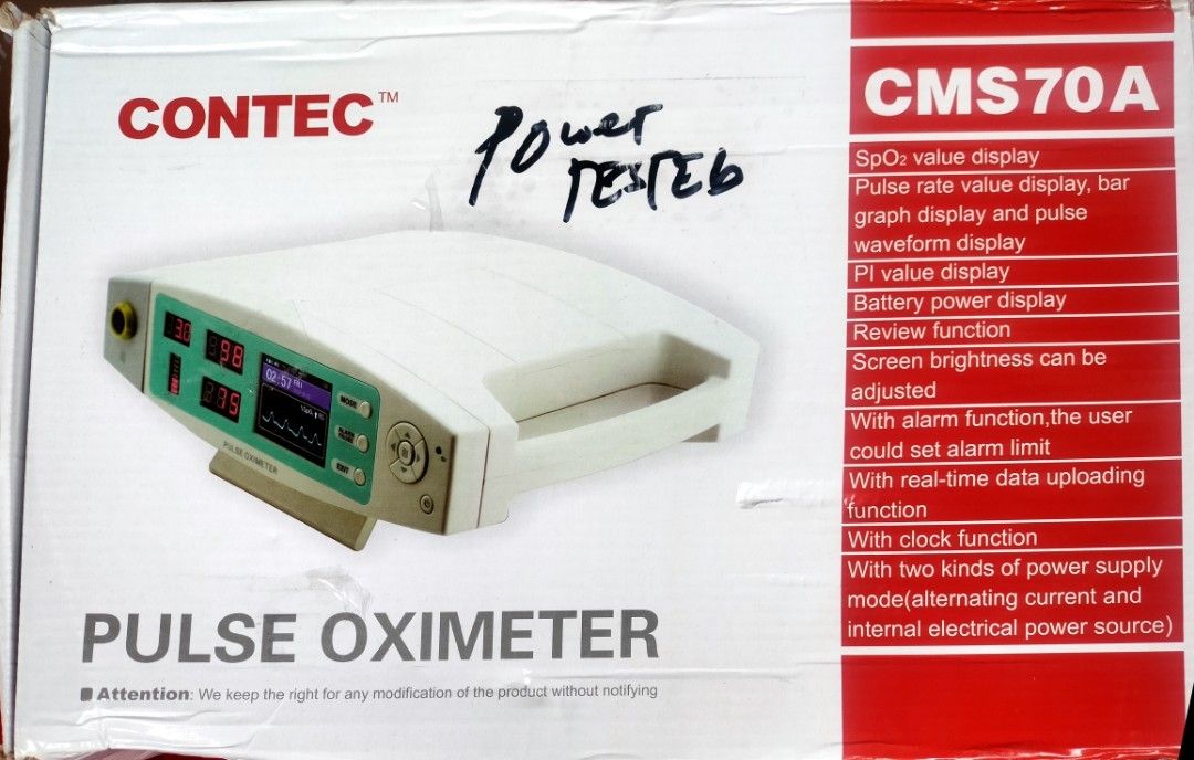 Contec CMS70A Pulse Oximeter (Category: Medical Supplies & Tools) located in Quezon City. Submitted by delvallelj58229 (Listing ID 1424057743, Image 2). Description: The image shows a Contec CMS70A Rechargeable / Mains Operated Desktop Pulse Oximeter. Function: Measures pulse oxygen saturation (\(SpO_{2}\)) and pulse rate (\(PR\)) through a finger sensor. Key Features: Includes a TFT screen and LED display, pulse waveform display, and menu operat