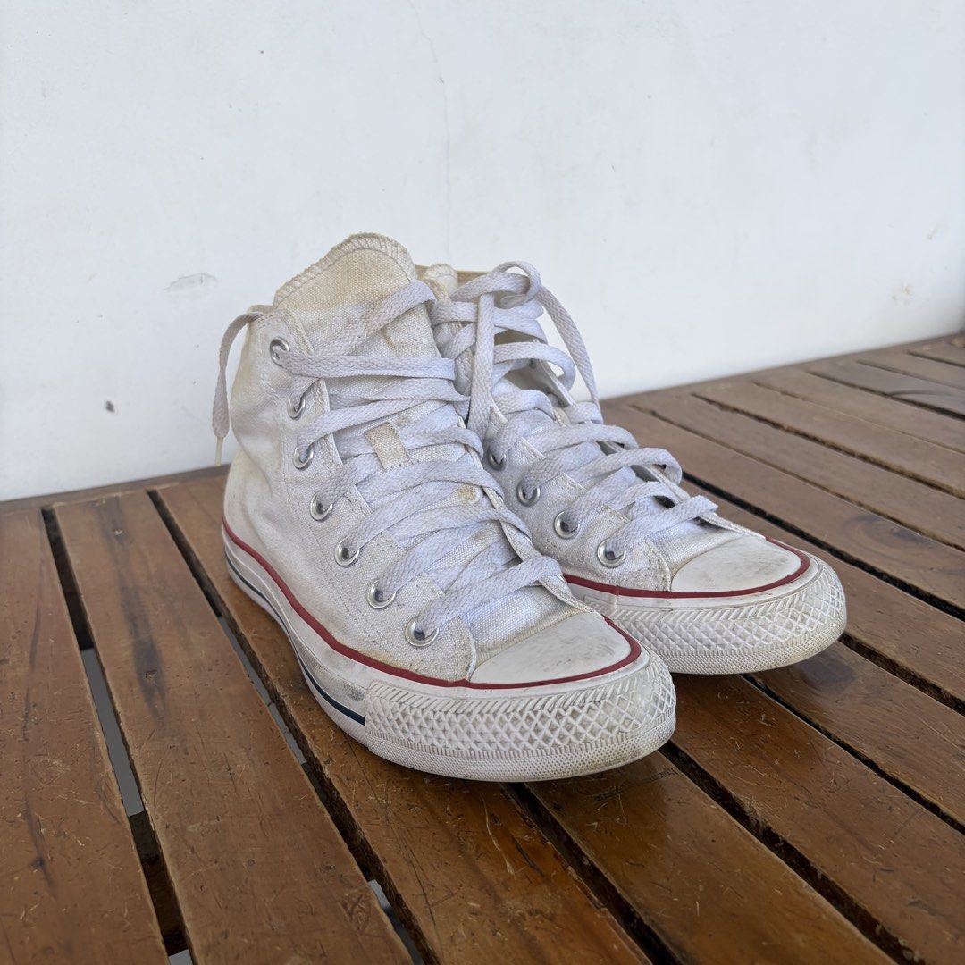 Converse Chuck Taylor All Star High Top (Category: Sneakers) located in Bulacan. Submitted by speczone (Listing ID 1424025437, Image 2). Description: Unisex - Men's 4. Needs wash but otherwise great. No sole sep! - Classic white Converse Chuck Taylor All Star high-top sneakers - Features the iconic Converse star logo and All Star patch - White laces and red/blue stripe on sole - Made in Vietnam - Size: US Women's 6, UK 4, EUR 36.5, 23 cm.