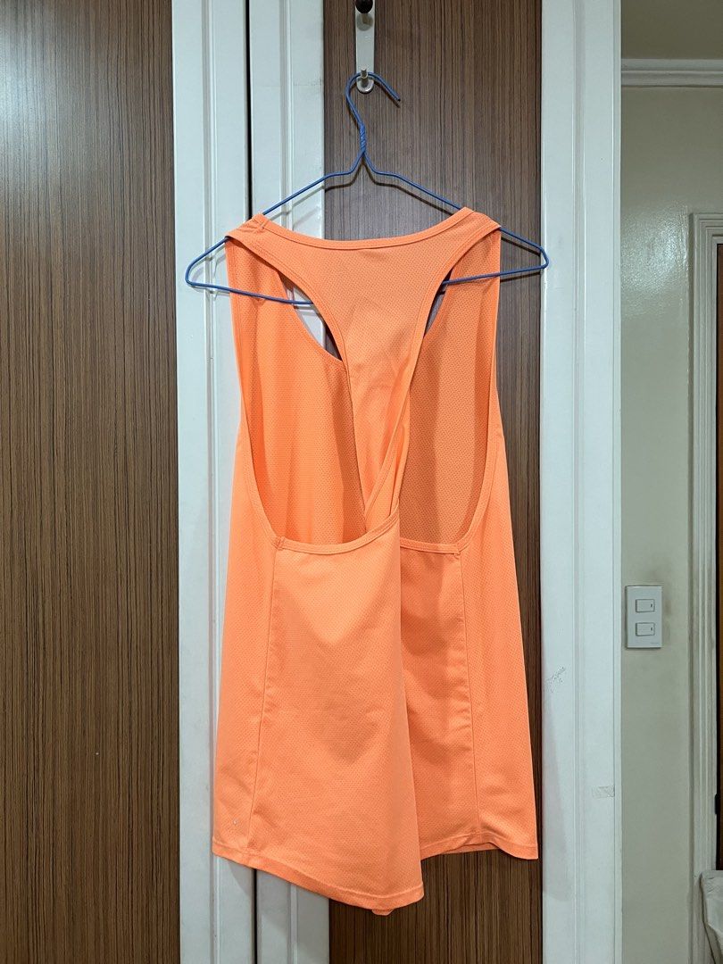 Cotton On Active Tank Top (Category: Activewear) located in Quezon City. Submitted by lightningdream (Listing ID 1424104062, Image 2). Description: Orange dri fit workout tank top from cotton on body.
