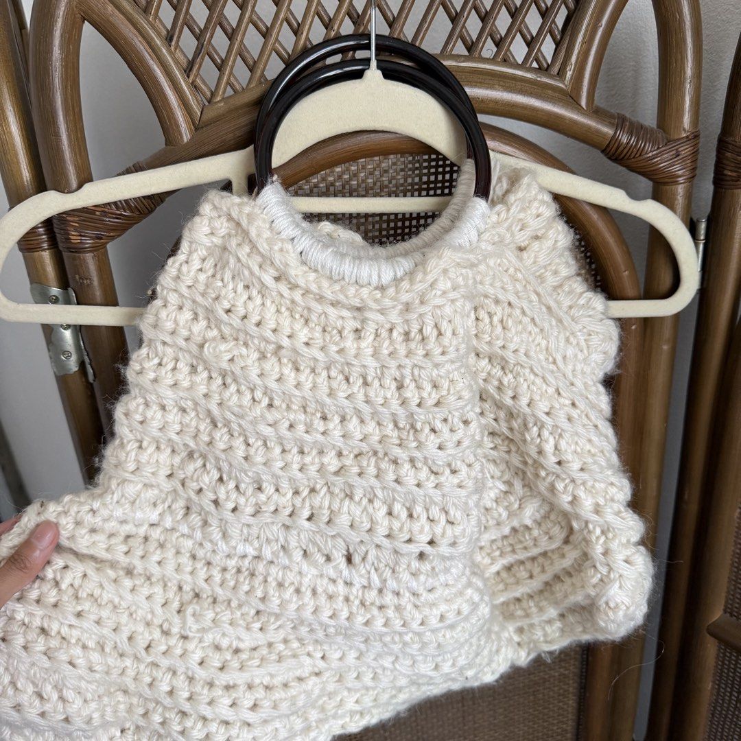 Crochet Handbag with Acrylic Handle (Category: Shoulder Bags) located in Tarlac. Submitted by gemini___sun (Listing ID 1424057070, Image 2). Description: - Handmade crochet handbag - Features a unique design - Cream color - Acrylic handle (dark brown) .