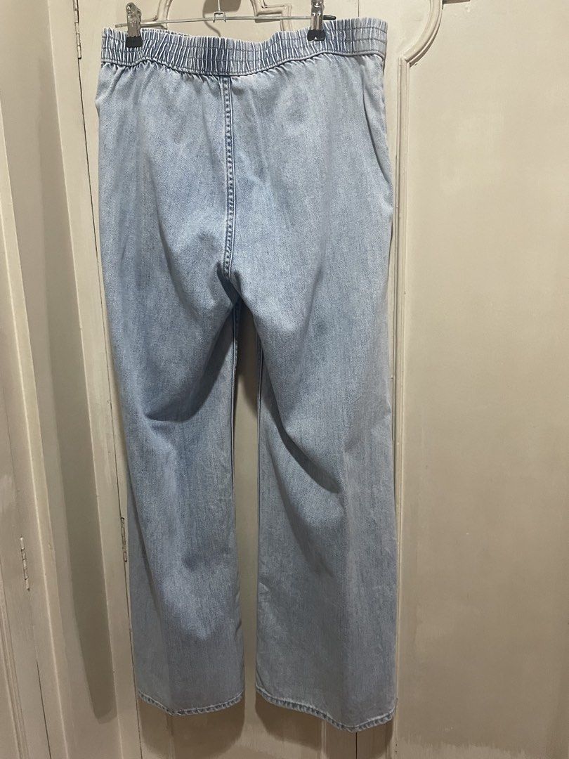 Divided Denim Wide Leg Pants (Category: Jeans) located in Quezon City. Submitted by deadmit (Listing ID 1424028689, Image 2). Description: - Divided light blue denim wide leg pants - Size: EUR 36, US 6, CA 6, CN 160/72A - Features: Elastic waistband, two front pockets - Fit: Relaxed - Condition: Good.