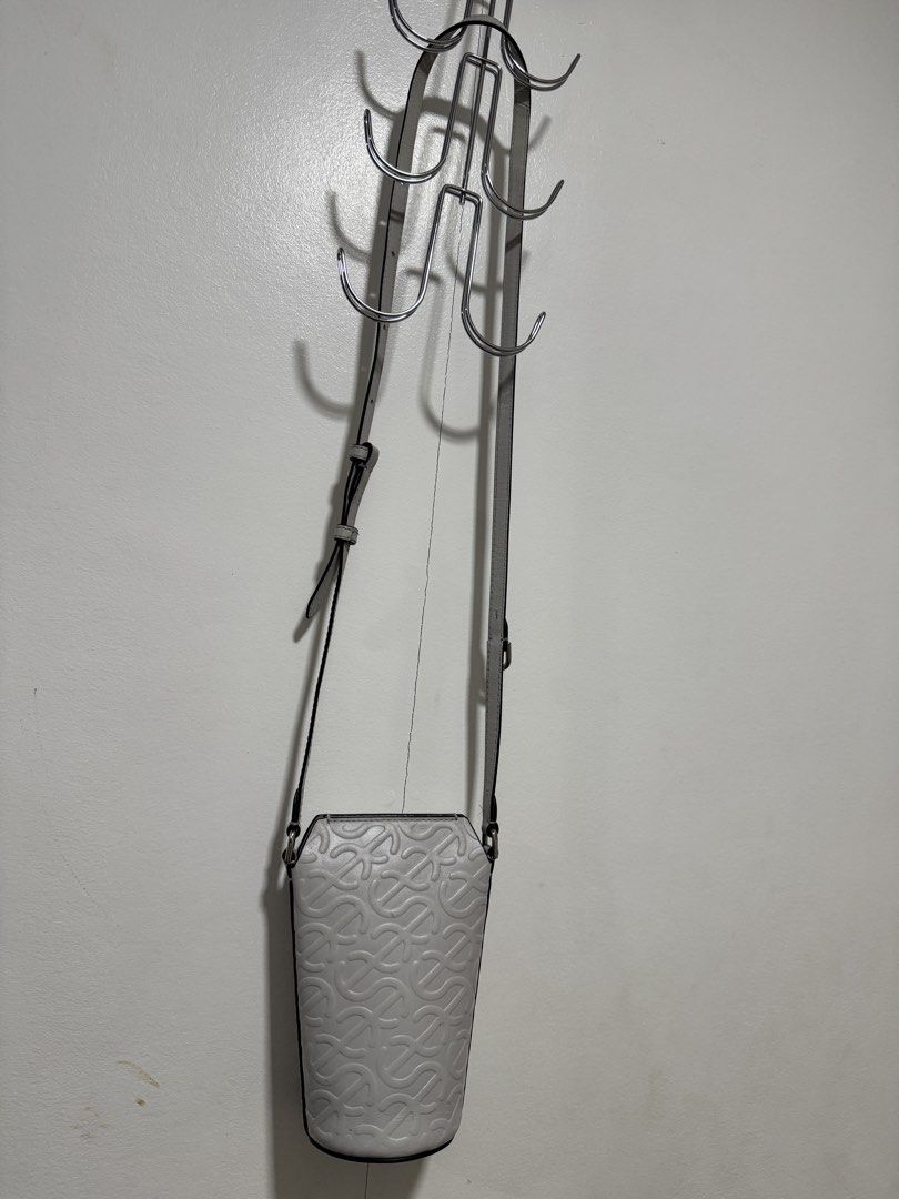 ECCO Wave Pot Leather Crossbody Bag - Grey (Category: Cross-body Bags) located in Angeles City. Submitted by asianchowqween (Listing ID 1424036512, Image 3). Description: - ECCO Wave Pot crossbody bag - Grey leather - Unique embossed pattern - Adjustable long strap - Cylindrical shape with flat bottom - Black interior - Perfect for everyday use.