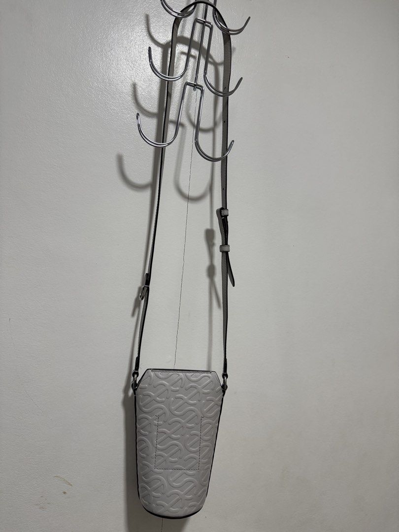 ECCO Wave Pot Leather Crossbody Bag - Grey (Category: Cross-body Bags) located in Angeles City. Submitted by asianchowqween (Listing ID 1424036512, Image 1). Description: - ECCO Wave Pot crossbody bag - Grey leather - Unique embossed pattern - Adjustable long strap - Cylindrical shape with flat bottom - Black interior - Perfect for everyday use.