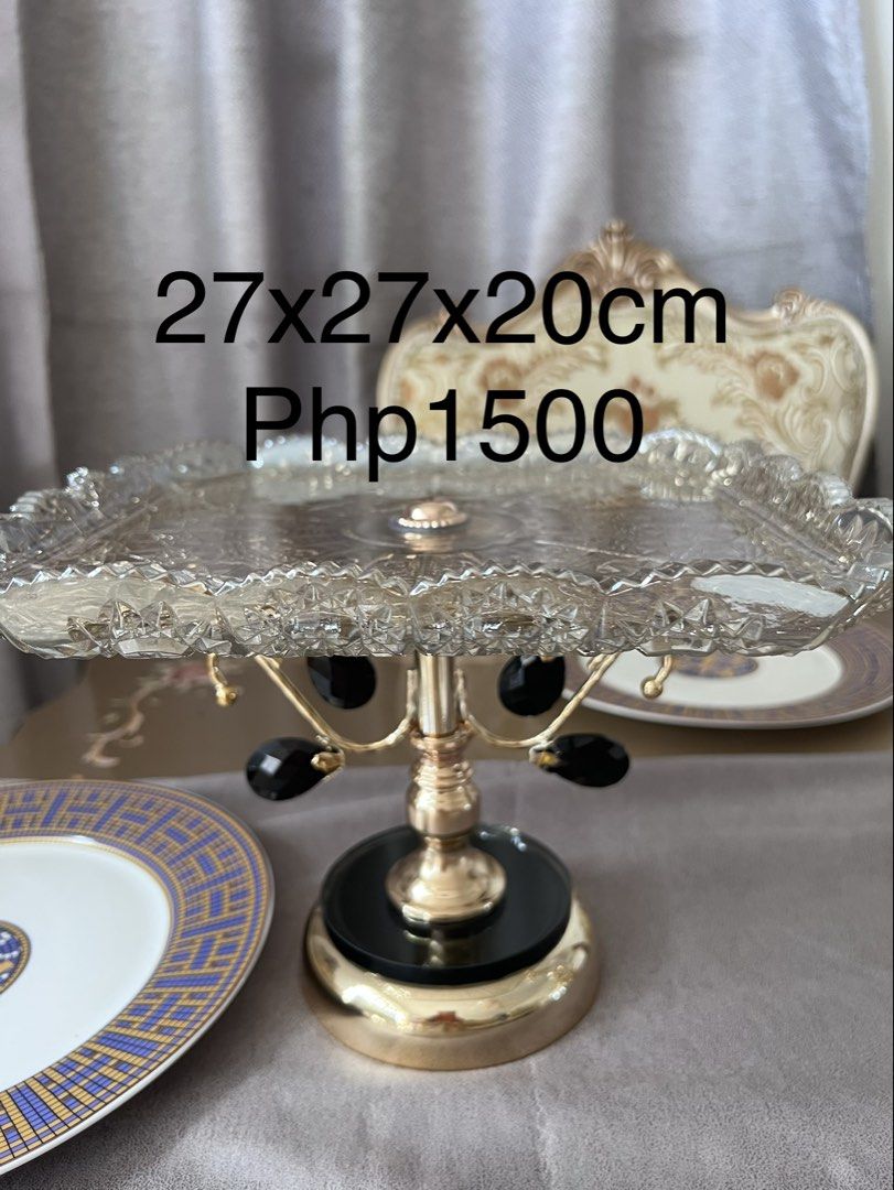 Elegant Glass Cake Stand (Category: Other Kitchenware & Tableware) located in Quezon City. Submitted by 09759391559 (Listing ID 1423976808, Image 3). Description: Glass stand cake fruit tray on hand makapal ang glass nya pwede pang accent center piece brand new 1500 each cod pwede free delivery kung 3 item kukunin cod nationwide pwede meet up! Quezon city area.