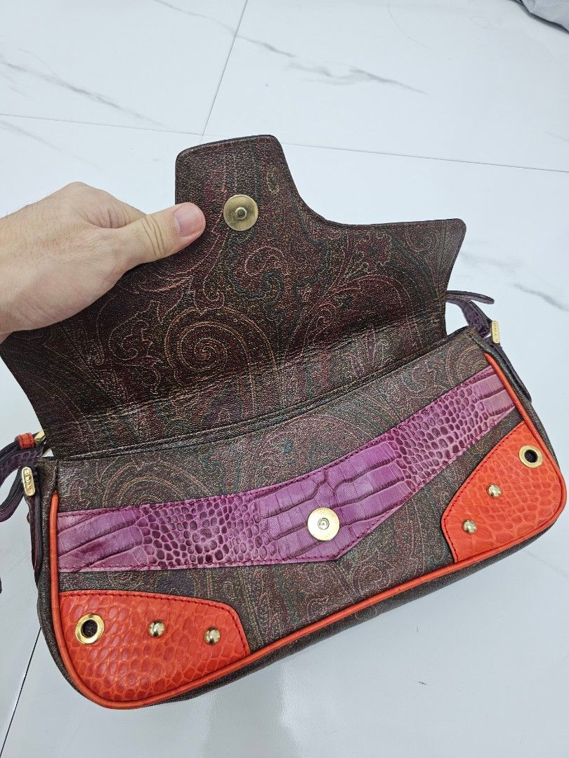 Etro Milano Shoulder Bag with Wallet (Category: Luxury Bags & Wallets) located in Las Pinas. Submitted by vanpru (Listing ID 1424142369, Image 3). Description: Etro shoulder bag With dustbag and wallet Very good condition, minimal sign of use - Etro Milano shoulder bag and matching wallet - Features a brown paisley pattern with red and purple accents - Shoulder bag with buckle closure and shoulder strap - Interior lined with purple fabric - Inclu