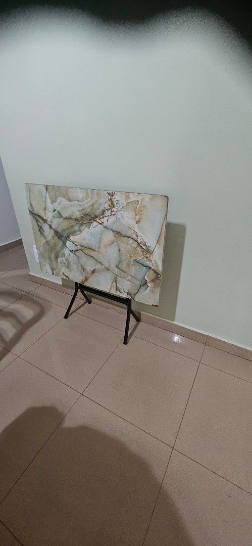 Foldable table (Category: Tables & Sets) located in Singapore. Submitted by nickccn55 (Listing ID 1424089555, Image 1). Description: 90cm x 60 cm very functional very practical space saving a slight chip at corner pick up near lorong chuan .