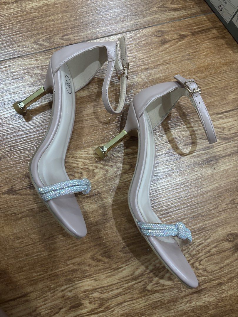 Gibi Muse Heels - Size 35 (Category: Heels) located in San Juan City. Submitted by ____aiceee____ (Listing ID 1424040922, Image 3). Description: - Gibi Muse heels - Nude color - Size 35 - Sparkling rhinestone strap - Gold-colored heel - Ankle strap with buckle - Includes original box Bought for P1,899.75 Used once Excellent condition.