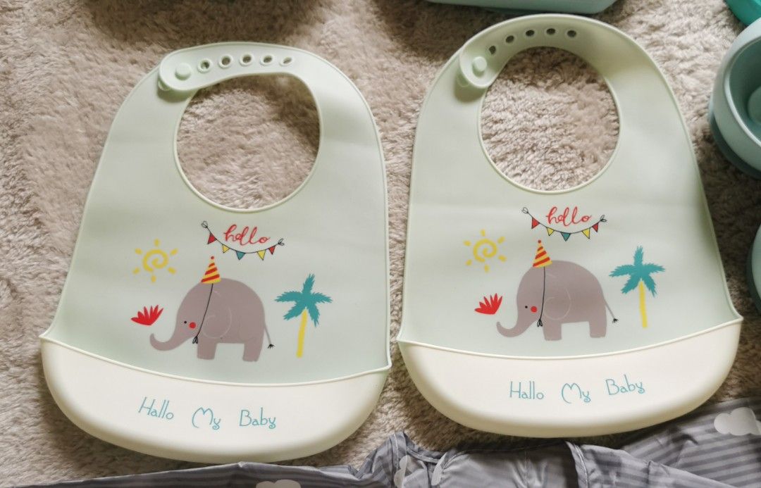 Hello My Baby Silicone Bibs (Category: Weaning & Toddler Feeding) located in Bulacan. Submitted by eyarmc28 (Listing ID 1423989929, Image 1). Description: Set of two silicone baby bibs. Features a cute elephant design with the words " My Baby". The bibs have a pocket to catch food and are adjustable. Made of soft, flexible silicone material. Easy to clean and perfect for mealtime..