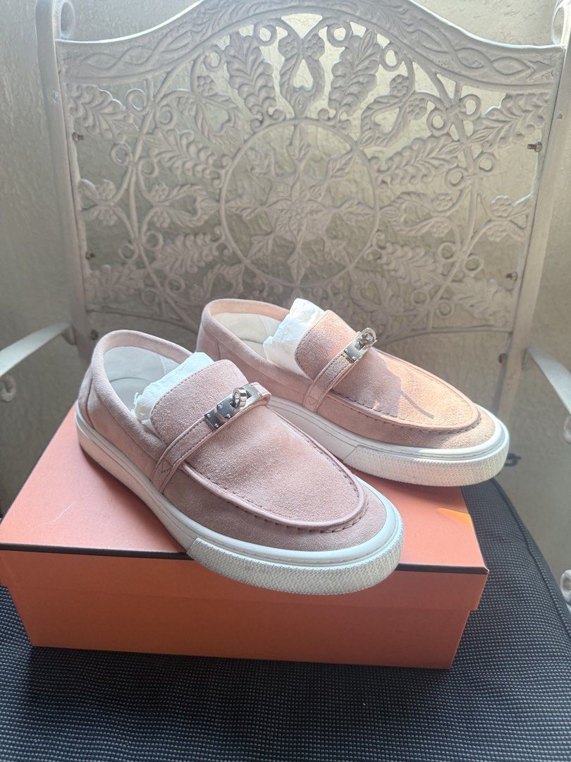Hermes Game-on Pink Suede Sneakers (Category: Sneakers) located in Valenzuela. Submitted by luxxe23 (Listing ID 1424098464, Image 1). Description: - AUTHENTIC STORE BOUGHT - Pink suede slip-on sneakers - White sole - Silver-tone buckle detail - Includes original box .