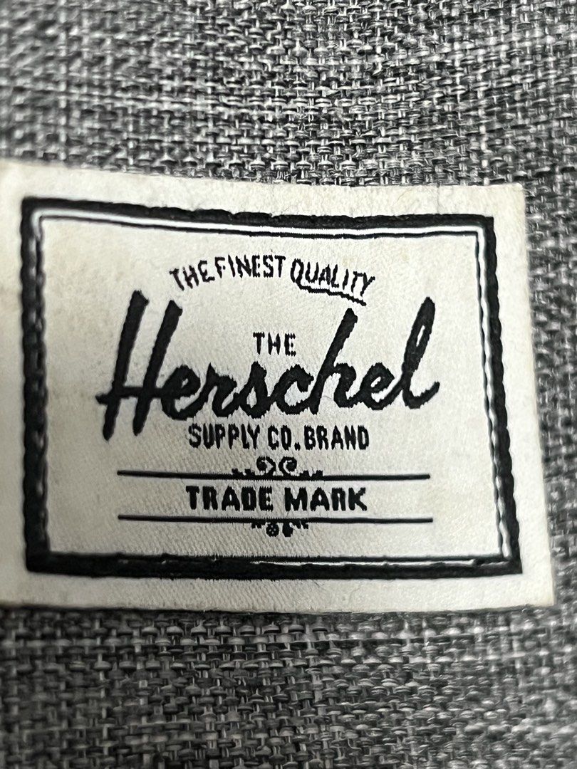 Herschel Supply Co. Fanny Pack (Category: Belt bags, Clutches and Pouches) located in Dasmarinas. Submitted by corruptdot (Listing ID 1424013344, Image 1). Description: - Herschel Supply Co. fanny pack - Color: Gray - Multiple front pockets - Adjustable strap - Red and white striped interior lining - Padded mesh back panel for comfort - Herschel logo patch and zipper pull.