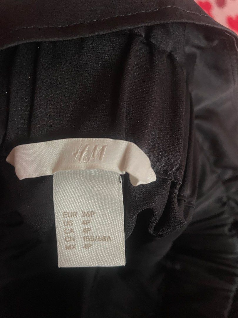 H&M Black Skirt with Tie (Category: Skirts) located in Mandaluyong City. Submitted by pechut.17 (Listing ID 1424028761, Image 3). Description: Washed only Never worn .