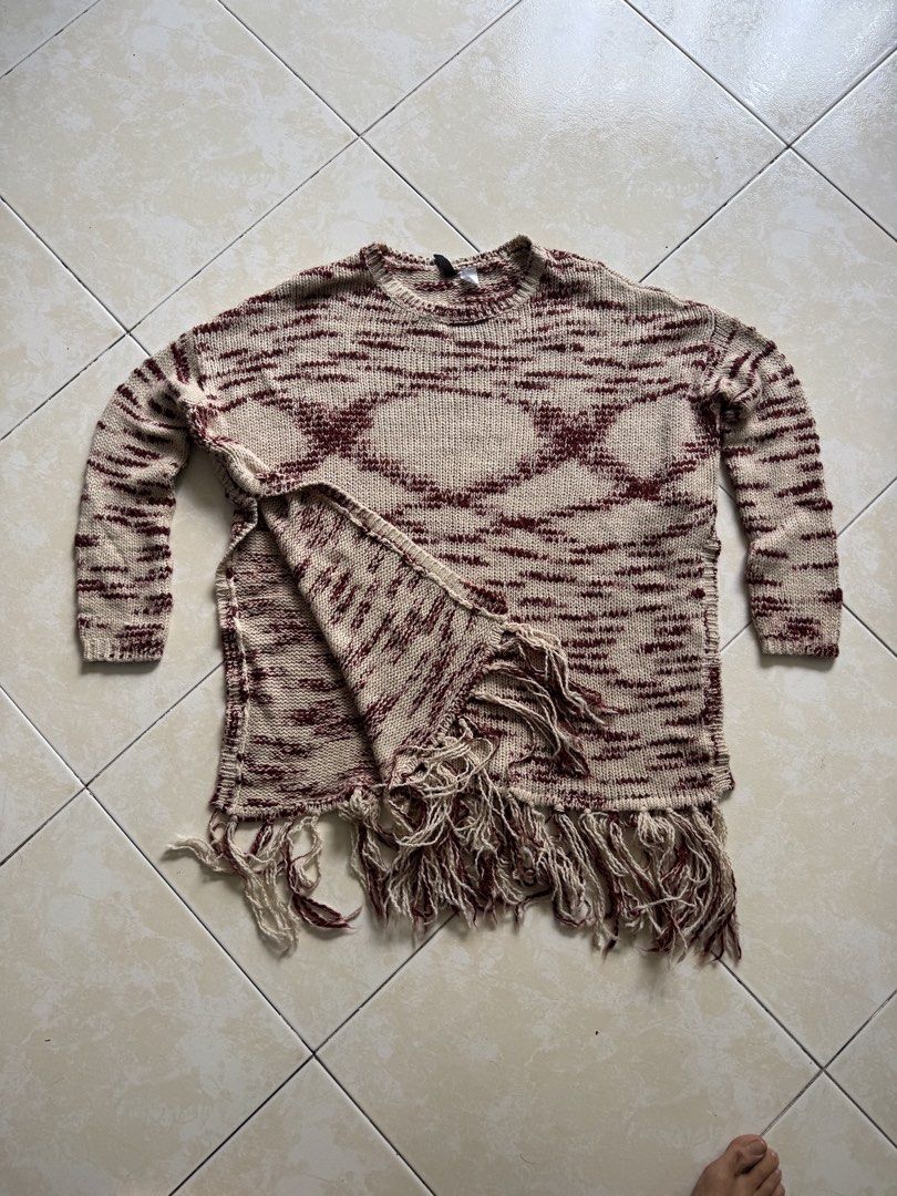 H&M Knitted Sweater with Fringe (Category: Coats, Jackets and Outerwear) located in Quezon City. Submitted by shndm25 (Listing ID 1424038823, Image 2). Description: - H&M sweater - Knitted design - Colors: Beige and maroon - Long sleeves - Fringe detail at the bottom - Round neckline - Relaxed fit - Suitable for various occasions.