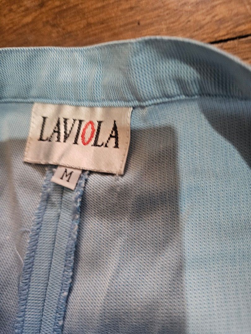 Laviola coordinate slacks blouse Suit Set - Light Blue (Category: Sets or Coordinates) located in Manila. Submitted by onlinesmartshopping12 (Listing ID 1423996205, Image 3). Description: - Laviola light blue suit set - Size: M - Includes: - Collared top with zipper and short sleeves, chest pocket - Matching pants with zipper and button closure.