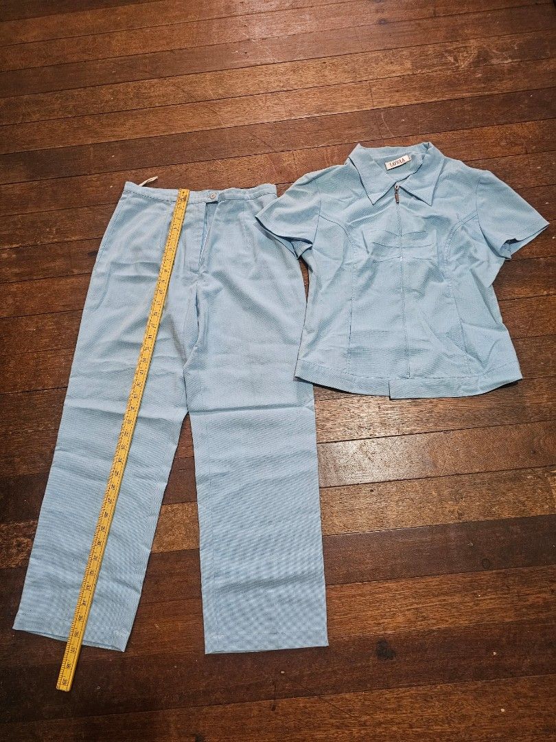 Laviola coordinate slacks blouse Suit Set - Light Blue (Category: Sets or Coordinates) located in Manila. Submitted by onlinesmartshopping12 (Listing ID 1423996205, Image 1). Description: - Laviola light blue suit set - Size: M - Includes: - Collared top with zipper and short sleeves, chest pocket - Matching pants with zipper and button closure.