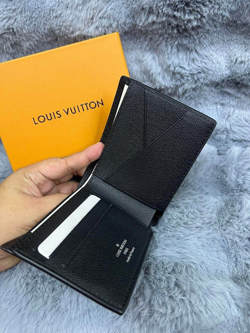 Louis Vuitton Monogram Eclipse Wallet(AUTHENTIC) (Category: Luxury Bags & Wallets) located in Manila. Submitted by puppyinsane (Listing ID 1424113452, Image 2). Description: - Authentic Louis Vuitton wallet - Monogram Eclipse canvas - Multiple card slots - Bill compartment - Includes original box - Made in France.