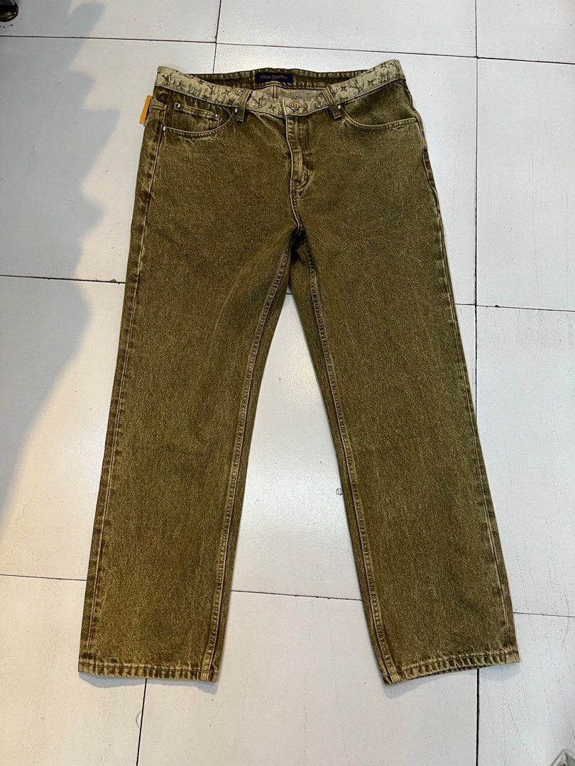 Louis Vuitton Monogram Jeans L676# Size 36 (Category: Jeans) located in Antipolo. Submitted by _lprpnzz (Listing ID 1424055814, Image 1). Description: Authentic Louis Vuitton jeans featuring the iconic monogram pattern on the back pockets and waistband. The jeans have a straight leg cut and a button closure with the Louis Vuitton logo. The size is 36. The jeans have a unique olive green color..