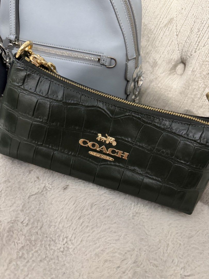 Michael Kors Black Handbag (Category: Luxury Bags & Wallets) located in Manila. Submitted by nini_archives (Listing ID 1424000225, Image 2). Description: Fendi backpack - 35k Coach - 25k Micheal Kors - 10k.