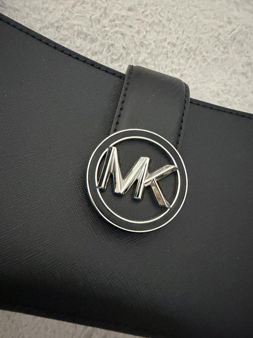 Michael Kors Black Handbag (Category: Luxury Bags & Wallets) located in Manila. Submitted by nini_archives (Listing ID 1424000225, Image 3). Description: Fendi backpack - 35k Coach - 25k Micheal Kors - 10k.