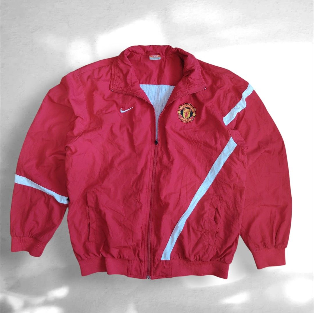 Nike Manchester United Jacket (Category: Coats, Jackets and Outerwear) located in Marikina City. Submitted by kingdrel (Listing ID 1423981042, Image 2). Description: - Red Nike jacket - Manchester United logo - Full zip closure - White accents on sleeves - Nike logo on chest - Mesh lining - Stand-up collar W 22 L27 VERYGOOD CONDITION NO ISSUE COLORATE 9.5-10.