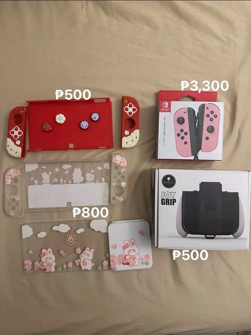 Nintendo Switch OLED Pink Controller and Grip (Category: Nintendo) located in Quezon City. Submitted by jacquilinedc (Listing ID 1424159168, Image 1). Description: all cases sold.
