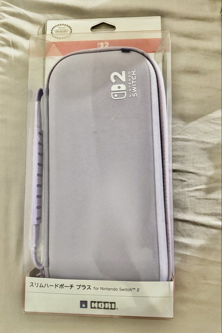 Nintendo Switch V2 Slim Case (Category: Nintendo) located in Makati City. Submitted by lalavs03 (Listing ID 1424021510, Image 1). Description: For Sale: Nintendo Switch 2 Slim Case Condition: New - never used/ opened RFS: Need funds and decluttering.