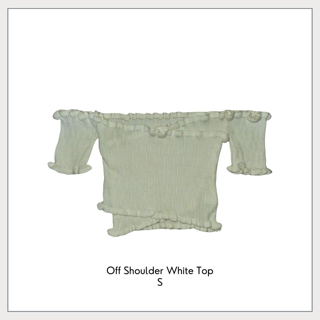 Off Shoulder White Top (Category: Blouses) located in Pasig City. Submitted by declutter_with_cha (Listing ID 1424008007, Image 1). Description: - White off-shoulder top - Size: XS-S - Short sleeves - Ruffled neckline and hem - Dress up or down.