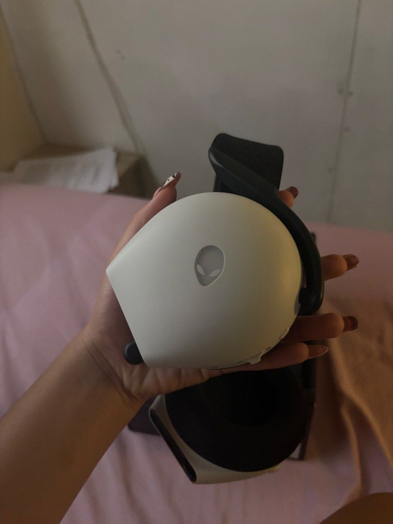 OFFER PRICE Alienware AW720H Tri-Mode Wireless Gaming Headset (Category: Headphones & Headsets) located in Manila. Submitted by junioangel61287 (Listing ID 1424015699, Image 3). Description: - Alienware AW720H Tri-Mode Wireless Gaming Headset - Features Dolby -Res Audio - Bluetooth connectivity - Includes headset, charging cable, and accessories - Up to 55 hours of battery life - Color: White and Black.