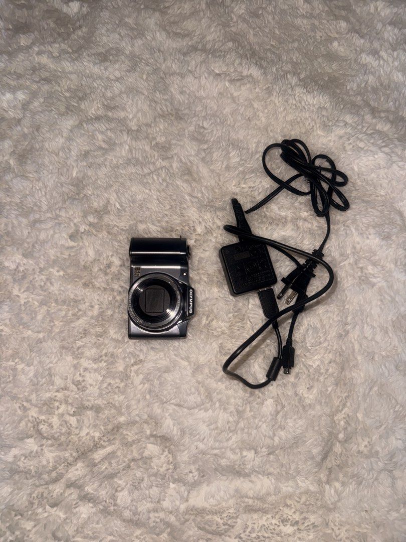 Olympus Digital Camera Stylus SZ-14 14.0MP Silver (Category: Cameras) located in Muntinlupa City. Submitted by prelovedfinds_mnl (Listing ID 1424064302, Image 1). Description: Olympus Stylus SZ-14 14.0MP Compact Digital Camera Silver Tested. with pop up flash (super chic and cute) This camera is in good condition with minor wear on the device. Please note: this listing includes a battery and charger. With Box Olympus SZ-14 Features The SZ-14 feat