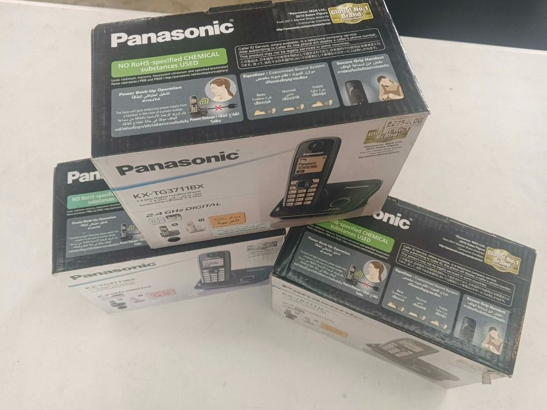 Panasonic KX-TG3711HX Cordless Phone (Category: Other Gadgets) located in Batac City. Submitted by vanillabuttercream (Listing ID 1424128521, Image 2). Description: - Panasonic KX-TG3711HX Cordless Phone - Black color - DECT phone - Caller ID feature - Includes phone and base (as shown in the box) - "NO RoHS-specified CHEMICAL substances USED".