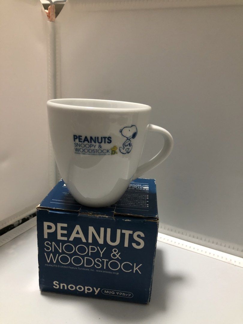 Peanuts Snoopy & Woodstock Mug (Category: Coffee & Tea Tableware) located in Manila. Submitted by rey_stat.store (Listing ID 1424133499, Image 3). Description: - Snoopy and Woodstock mug - Features the Peanuts logo and character illustrations in blue - White mug body - Includes original box - Ideal for Peanuts enthusiasts.