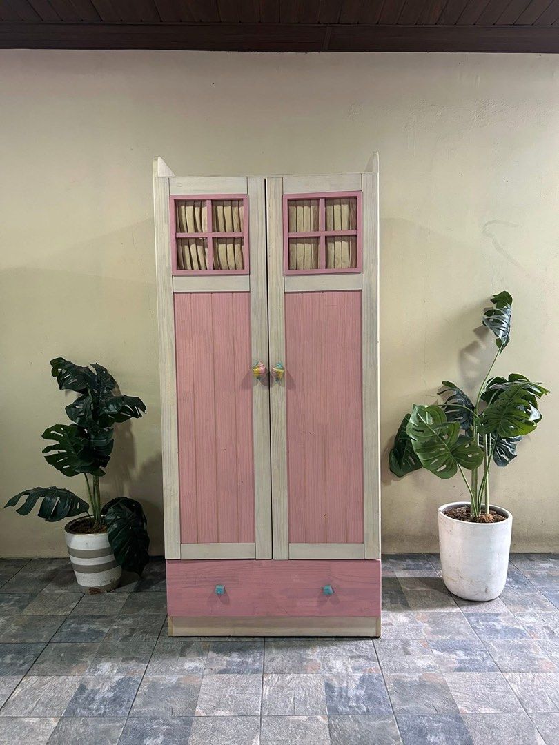 Pink Wooden Wardrobe with Drawer (Category: Shelves, Cabinets & Racks) located in Angeles City. Submitted by honeybowteek23 (Listing ID 1424162594, Image 1). Description: Imported Pink Wardrobe Cabinet from Korea P6,500 Only 24x32x70in 2 Door Pink Heavy Duty No issue Good Condition Minor Scratch From Korea Loc:, Angeles City.