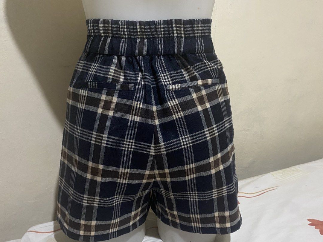 Plaid High-Waisted Shorts (Category: Shorts) located in Cavite. Submitted by yhannashoppe_08 (Listing ID 1424045500, Image 2). Description: - High-waisted plaid shorts - Comfortable elastic waistband (back) - Decorative buttons - Two front pockets - Length: Approximately 38cm - Brand: Majestic legon - Bounght in japan - See photos for dimension - Plus shipping fee.
