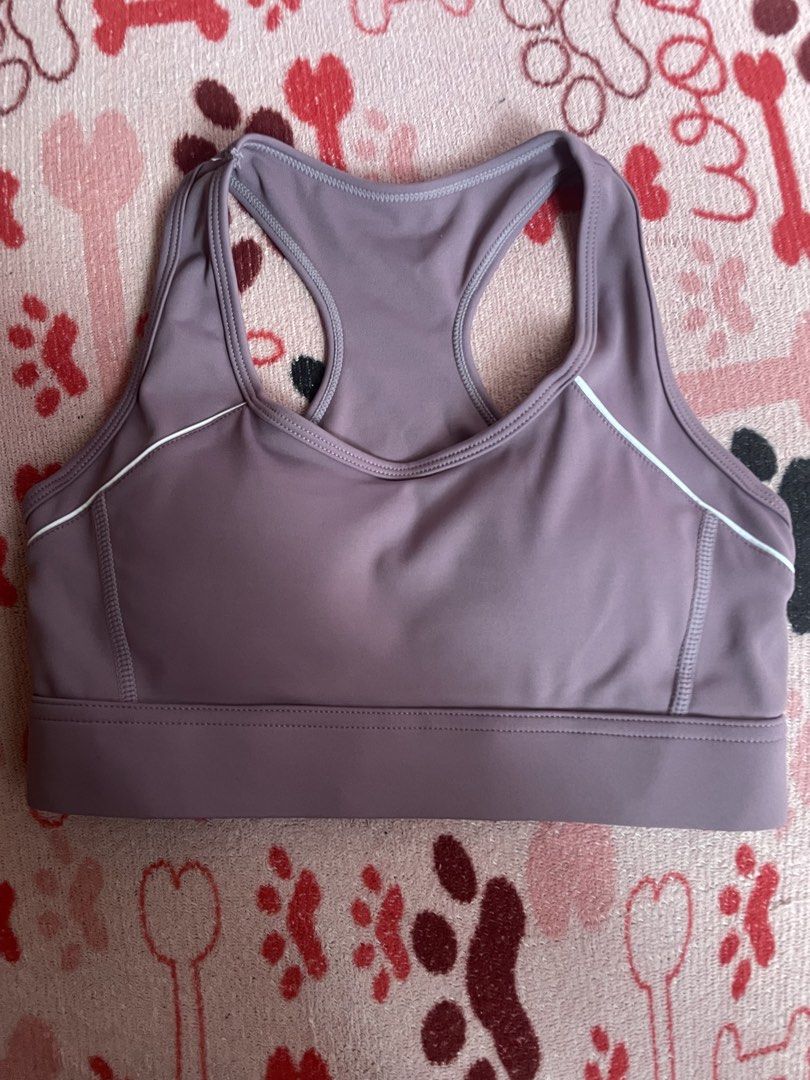 Purple Sports Bra (Category: Activewear) located in Mandaluyong City. Submitted by pechut.17 (Listing ID 1424031289, Image 1). Description: - Beautiful purple sports bra - Racerback design with keyhole back - Adjustable fit with hook-and-eye closure - Stylish white trim - Made from smooth, supportive fabric.