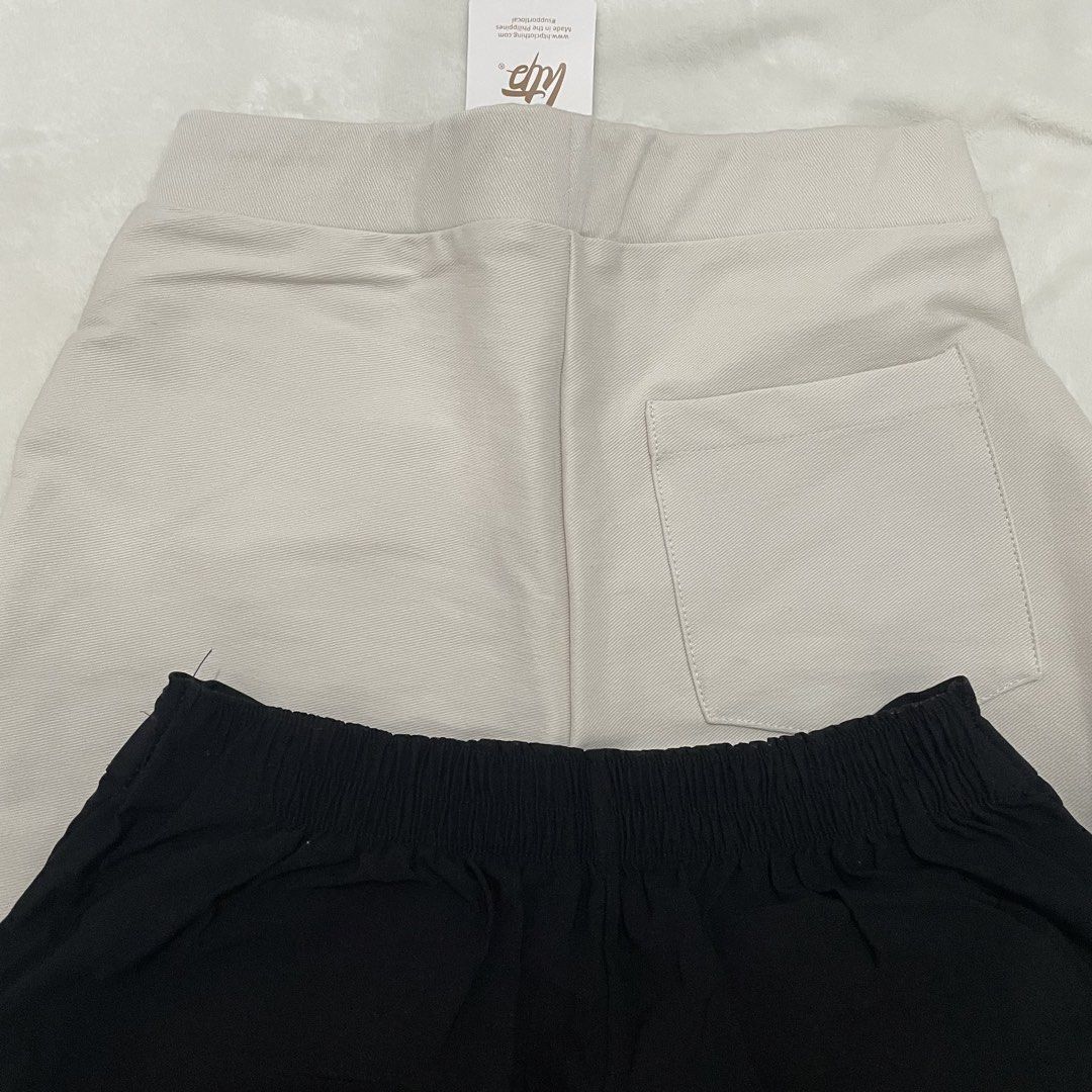 Set only - Office Pants - Beige and Black (Category: Other Bottoms) located in Manila. Submitted by reloom (Listing ID 1424038516, Image 3). Description: - Beige HTP pants: straight leg, with tag and back pocket. - Black unbranded pants: pleated front with elastic waistband. - Both pairs made of lightweight material. Both stretchy - size 24 to 28.