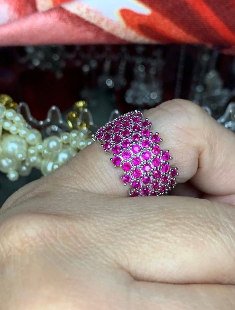 Six Row Real Ruby Ring (UV Reactive) (Category: Rings) located in Batangas. Submitted by thriftshop_izy15 (Listing ID 1424072771, Image 2). Description: - Stunning ring with real ruby stones - Unique stone arrangement for a dazzling effect - Silver-colored metal - A great addition to your jewelry collection - Size: Fits 6- 6.5 (Adjustable).