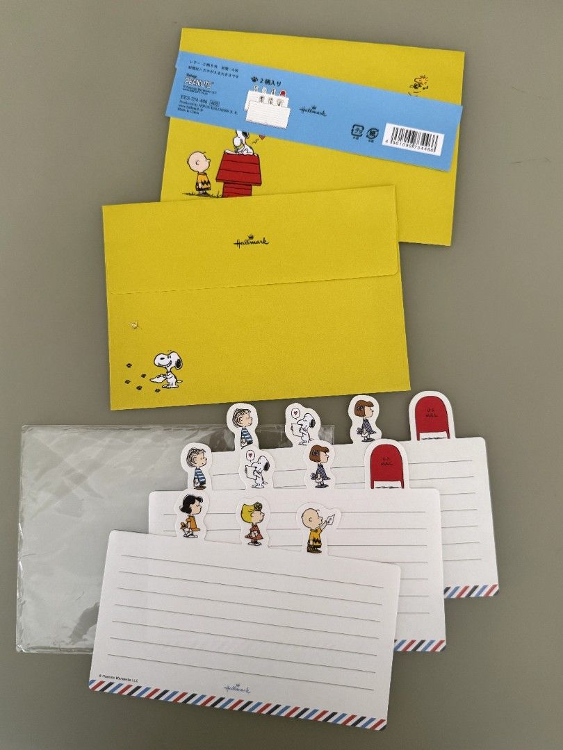 Snoopy Stationery Set (Category: Stationery & School Supplies) located in Manila. Submitted by batoicexan16856 (Listing ID 1424128779, Image 1). Description: Stationery set features a Snoopy theme. It includes yellow notebooks, lined writing paper with airmail borders, and Snoopy character paper clips. The set is packaged in a clear plastic sleeve. Perfect for school or personal use..