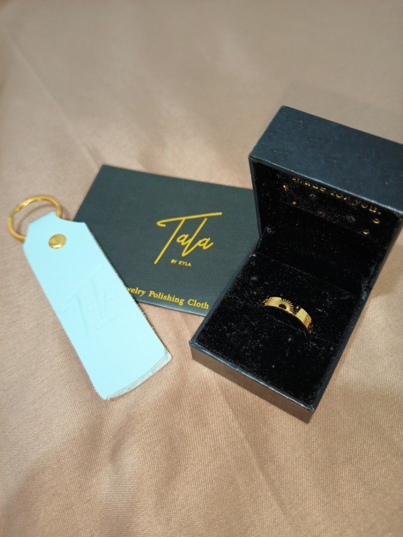 Tala by Kyla Ring (Category: Rings) located in Rizal. Submitted by declutterprod (Listing ID 1424001473, Image 2). Description: - Tala by Kyla gold ring (GOLD-PLATED ONLY NOT REAL GOLD) - Includes original box - Comes with jewelry polishing cloth - Includes a keychain - Perfect for gifting or personal use.