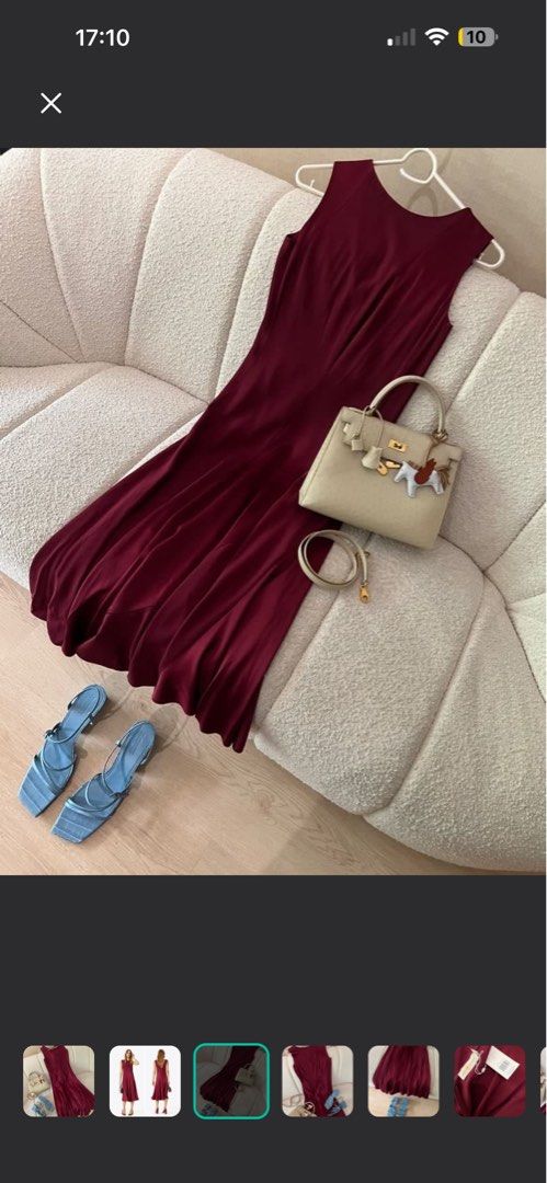 Tory Burch Imperial Garnet Dress (Category: Luxury Apparel) located in Makati City. Submitted by elenank.595 (Listing ID 1424065638, Image 3). Description: Tory Burch Imperial Garnet dress, size 2. Sleeveless, V-neck, flowing skirt. New without tags, worn once. Perfect for special occasions. Message me for when worn :).