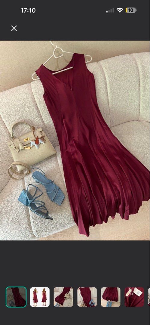 Tory Burch Imperial Garnet Dress (Category: Luxury Apparel) located in Makati City. Submitted by elenank.595 (Listing ID 1424065638, Image 2). Description: Tory Burch Imperial Garnet dress, size 2. Sleeveless, V-neck, flowing skirt. New without tags, worn once. Perfect for special occasions. Message me for when worn :).