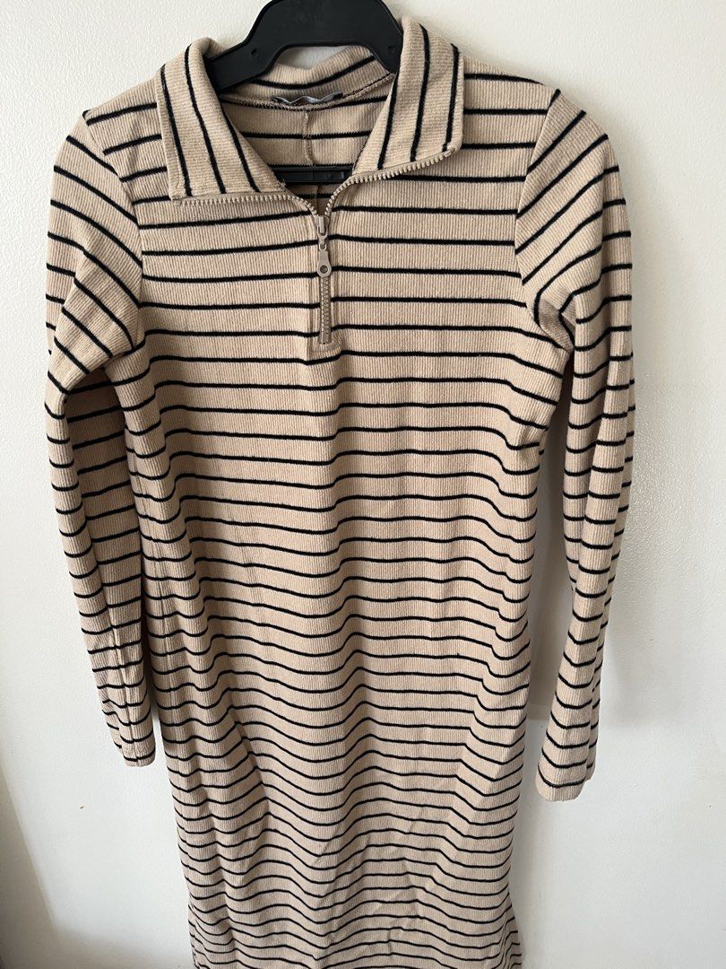 Trendyol Striped Dress with Collar (Category: Dresses) located in Taguig. Submitted by luxe_rewind (Listing ID 1424043725, Image 3). Description: - Collared neckline - Zipper closure - Long sleeves - Striped pattern (beige and black) - Ribbed fabric - Midi length.