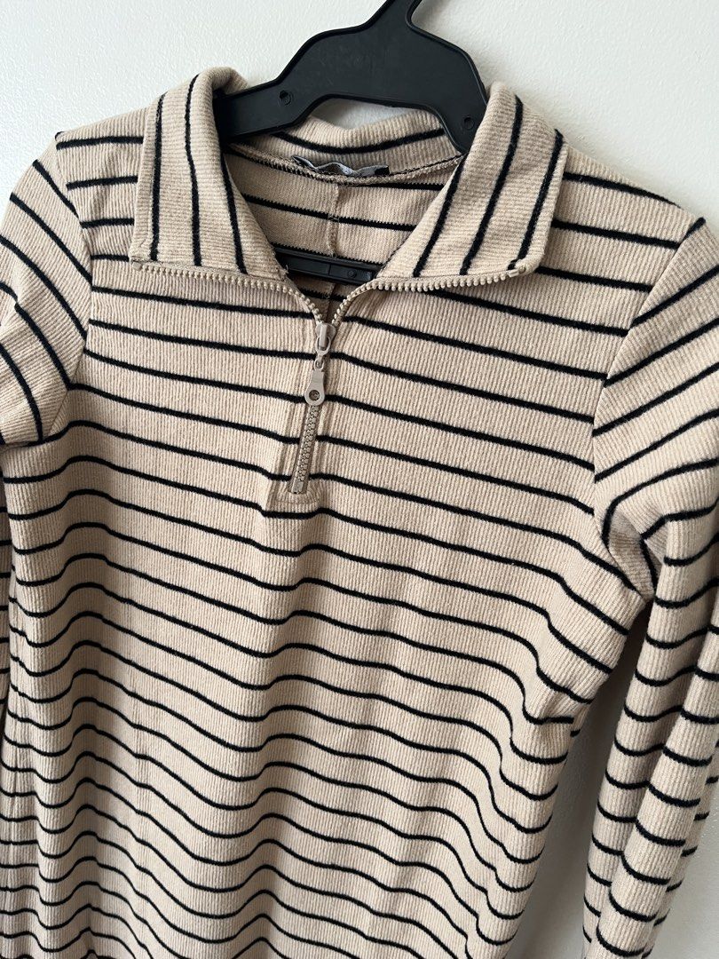 Trendyol Striped Dress with Collar (Category: Dresses) located in Taguig. Submitted by luxe_rewind (Listing ID 1424043725, Image 2). Description: - Collared neckline - Zipper closure - Long sleeves - Striped pattern (beige and black) - Ribbed fabric - Midi length.