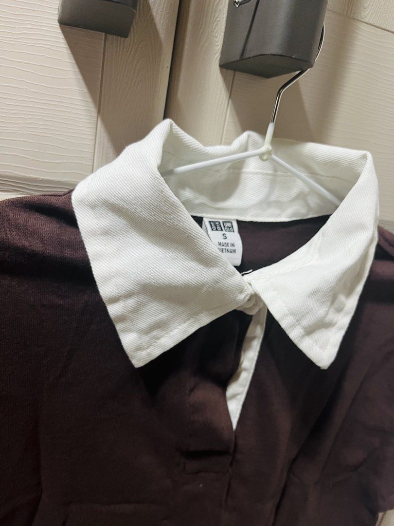 UNIQLO INSPIRED CROPPED COLLARED SHIRT (Category: Shirts) located in Bulacan. Submitted by neiijj (Listing ID 1424145755, Image 3). Description: USED ONCE‼️ DECLUTTERING- PERSONAL USE - Uniqlo Inspired Rugby Shirt - Color: Dark Brown with White Collar - Size: S-M - Features: Short Sleeves, Button-up Neckline - Made in Vietnam - Perfect for everyday wear.