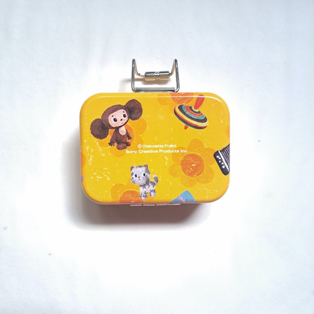 Vintage Cheburashka Tin Trinket box (Category: Food Organization & Storage) located in M'Lang. Submitted by ardinelle.finds (Listing ID 1424099131, Image 1). Description: This is a small trinket box featuring the Russian cartoon character "Cheburashka." `□` Feel free to message me for any questions or inquiries..