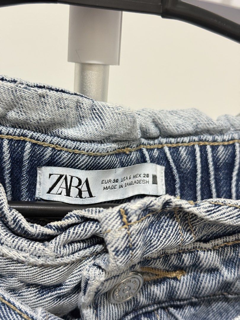 Zara paperbag denim shorts (Category: Shorts) located in Taguig. Submitted by sofya07 (Listing ID 1424059436, Image 3). Description: high-waisted design with a tie belt and rolled cuffs.
