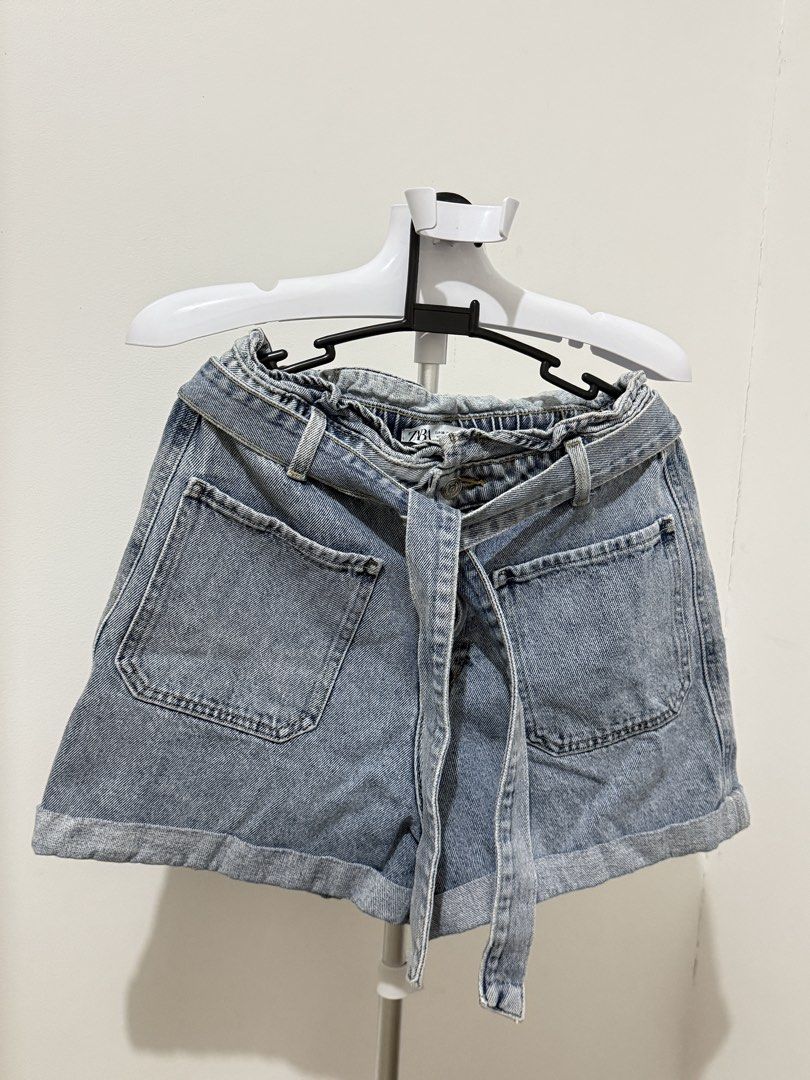Zara paperbag denim shorts (Category: Shorts) located in Taguig. Submitted by sofya07 (Listing ID 1424059436, Image 2). Description: high-waisted design with a tie belt and rolled cuffs.
