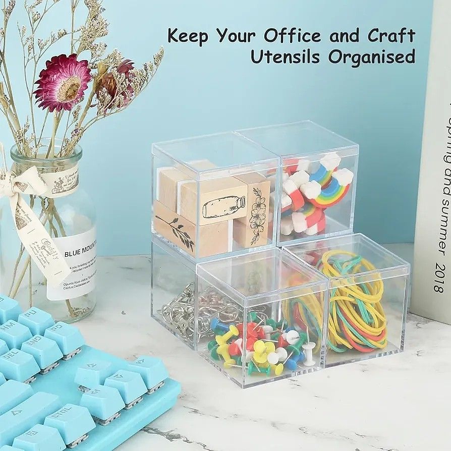 50mm Figure Display Box - sold each (Category: Storage Boxes & Baskets) located in Quezon City. Submitted by an.marie (Listing ID 1425756761, Image 3). Description: These clear acrylic display boxes are perfect for showcasing small items like figurines, collectibles, or craft supplies. They provide a clean and organized way to protect and display your items. The boxes are square-shaped with a removable lid, allowing easy access and arrangement. I