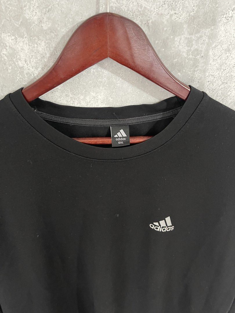 Adidas Black Sweatshirt XXL (Category: Coats, Jackets and Outerwear) located in Manila. Submitted by remixdripcollections (Listing ID 1425721625, Image 3). Description: - Adidas Black Sweatshirt - Size: 6XL - Features the iconic Adidas logo - Classic black color - Perfect for casual wear Length 29 Width 24.
