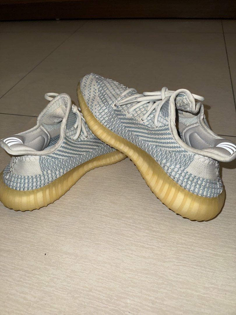 Adidas Yeezy Boost 350 V2 Blue Tint (Category: Sneakers) located in Manila. Submitted by terefficstuffs (Listing ID 1425749613, Image 2). Description: Adidas Yeezy Boost 350 V2 in a blue tint colorway. Features a Primeknit upper with a blue and white pattern. The midsole has a translucent, yellowish appearance. Includes the signature side stripe and heel tab. The laces are light grey..