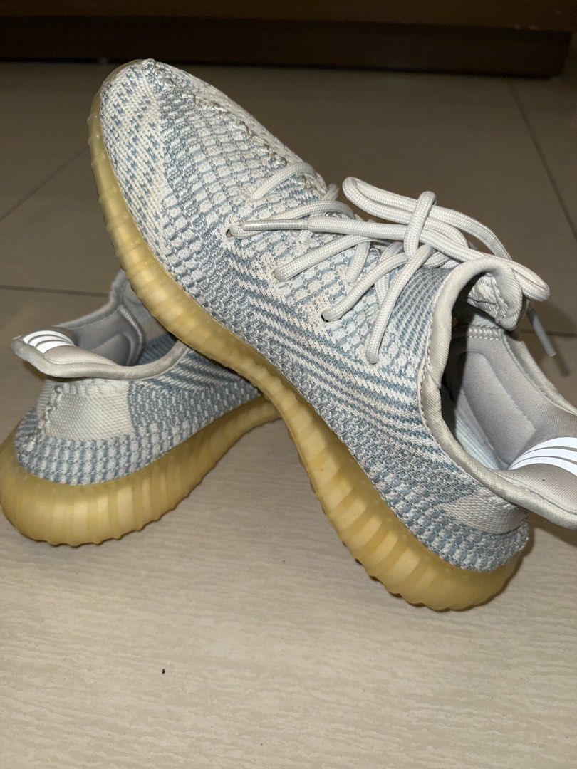 Adidas Yeezy Boost 350 V2 Blue Tint (Category: Sneakers) located in Manila. Submitted by terefficstuffs (Listing ID 1425749613, Image 1). Description: Adidas Yeezy Boost 350 V2 in a blue tint colorway. Features a Primeknit upper with a blue and white pattern. The midsole has a translucent, yellowish appearance. Includes the signature side stripe and heel tab. The laces are light grey..